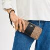 Portafoglio lungo con chiusura a zip perimetrale in Signature Canvas a righe