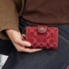 Portafoglio medio con cerniera angolare in denim esclusivo