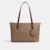Portamonete circolare in Signature Canvas