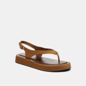 Sandali con plateau e C scolpita