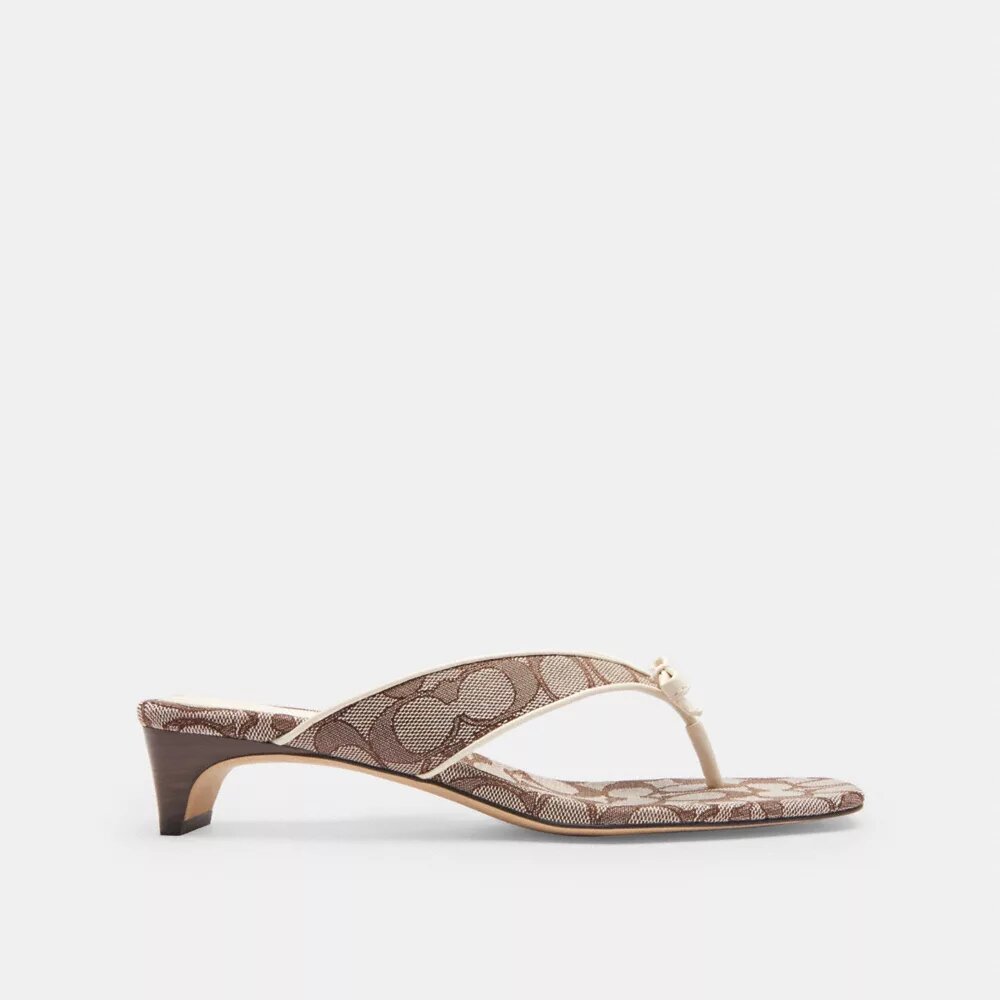 Sandalo con tacco basso e cinturino a fiocco in jacquard esclusivo