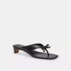 Scarpe con tacco basso con cinturino a fiocco