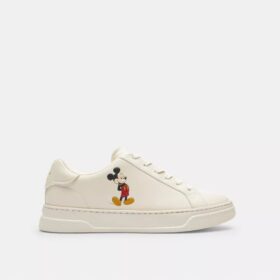 Sneaker alte Disney X Coach con Topolino
