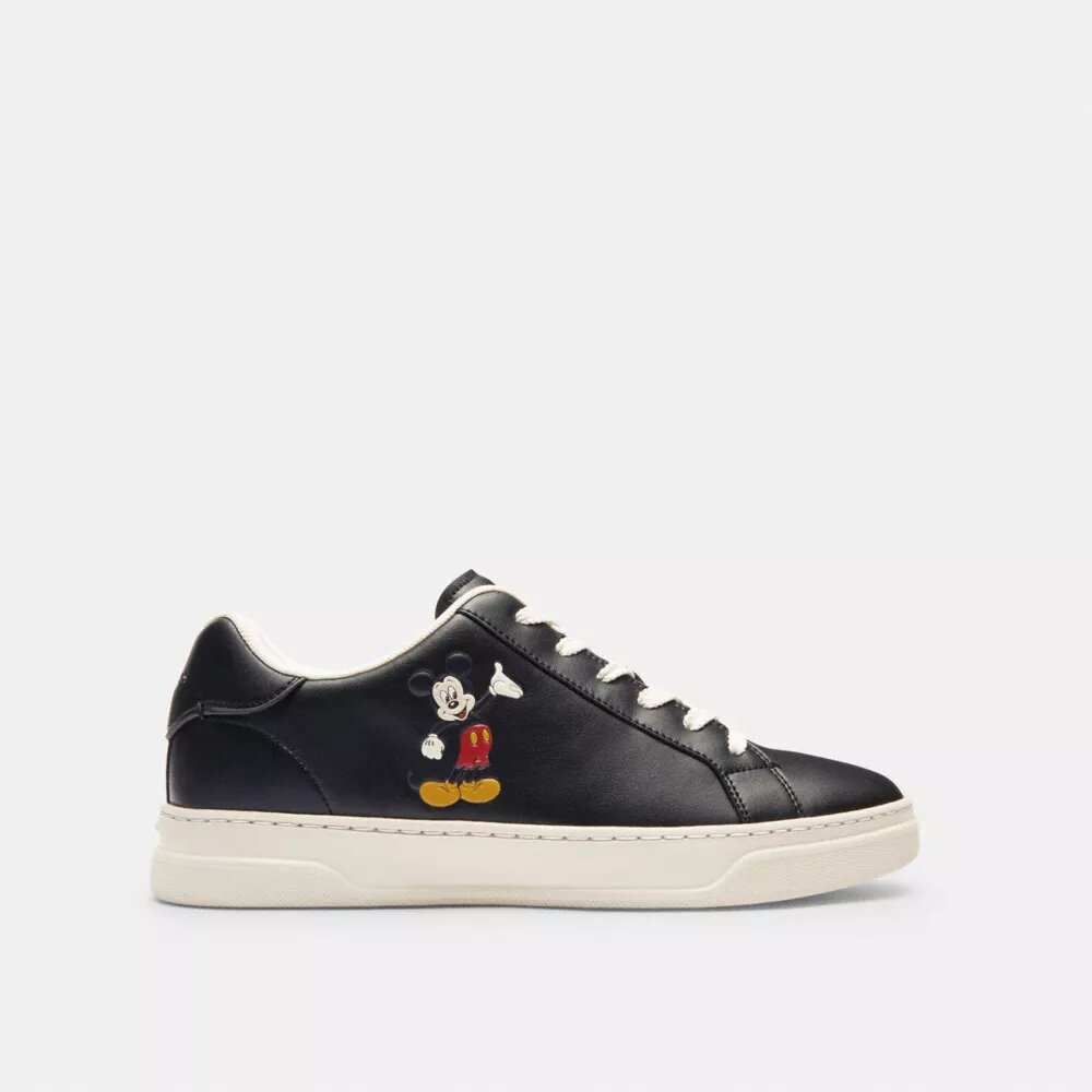 Sneaker alte Disney X Coach con Topolino