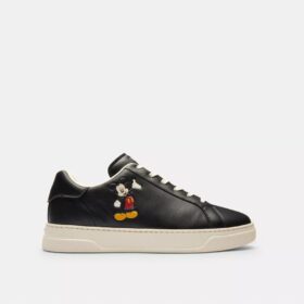 Sneaker alte Disney X Coach con Topolino