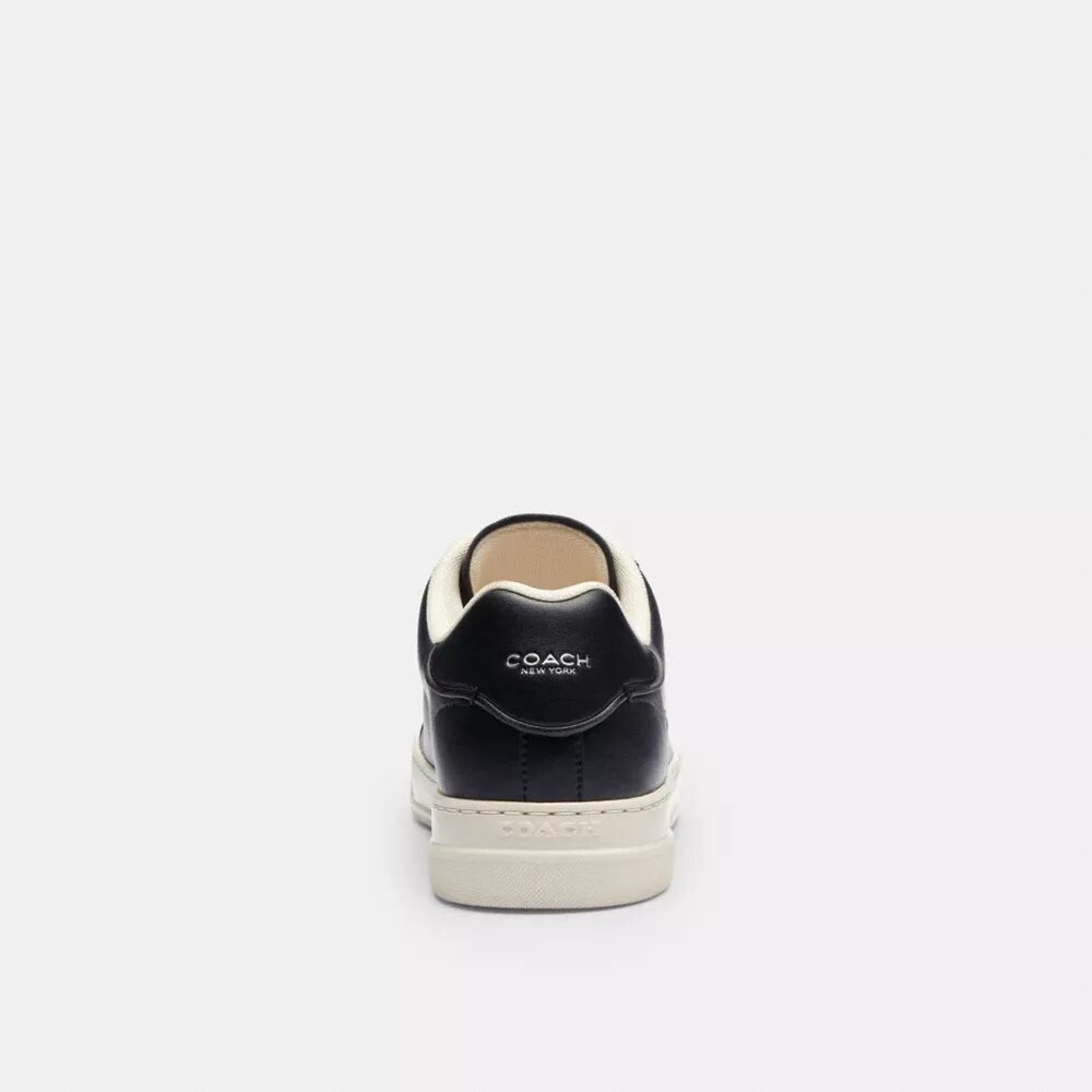 Sneaker alte Disney X Coach con Topolino