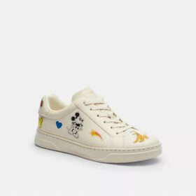 Sneaker Disney X Coach alte con stampa adesiva