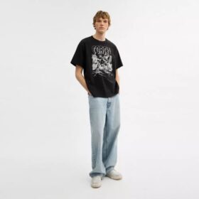 T-shirt comoda “Dinosaur City” in cotone biologico