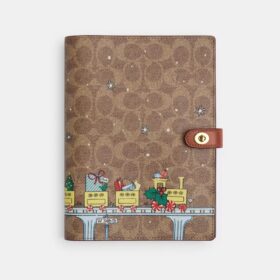 Taccuino in Signature Canvas con motivo “Treno delle feste”
