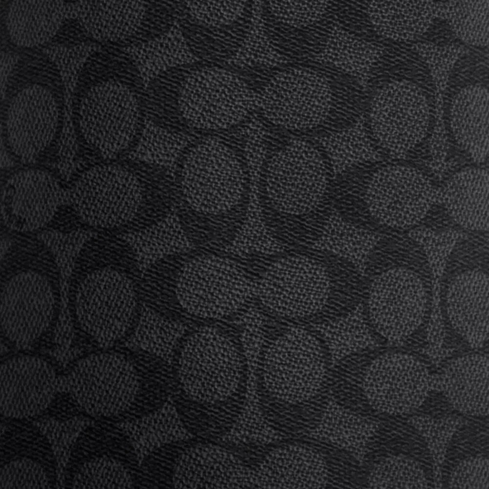 Zaino a tracolla Dominic in Signature Canvas