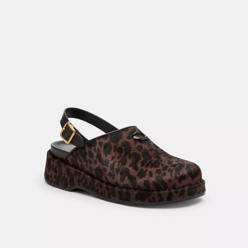 Zoccoli con plateau a C scolpiti e stampa leopardata