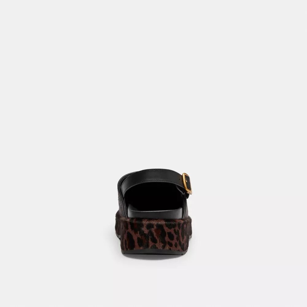 Zoccoli con plateau a C scolpiti e stampa leopardata