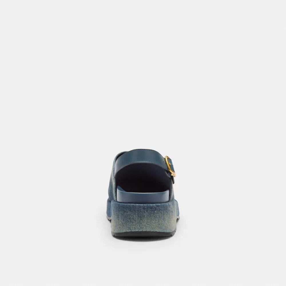 Zoccoli con plateau a C scolpiti in denim dall’effetto vissuto